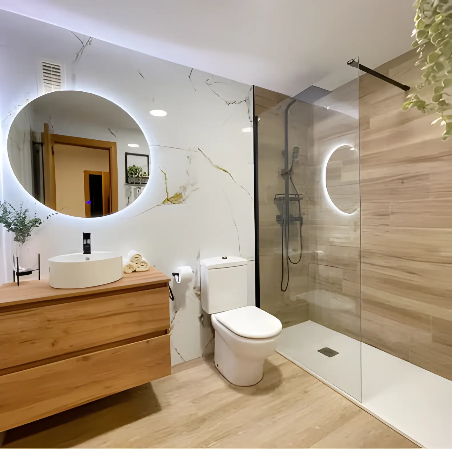 Baño reformado en Móstoles con mampara y grifería nueva